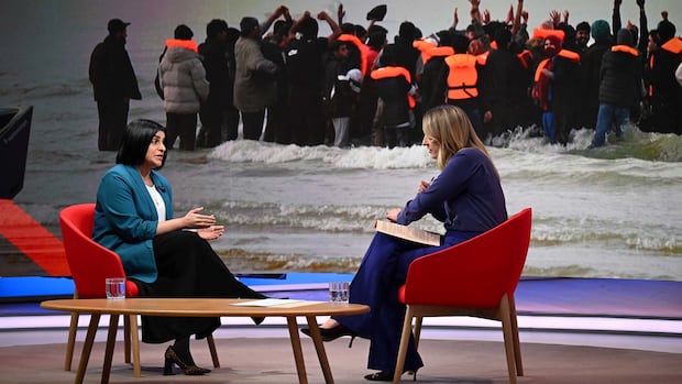 Britain to make refugee status temporary under asylum overhaul