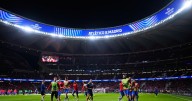 Atletico Madrid fined for racist behavior by fans at Champions League game at Arsenal