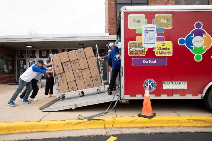 Hundreds volunteer at Pioneer High School to create 50K meals