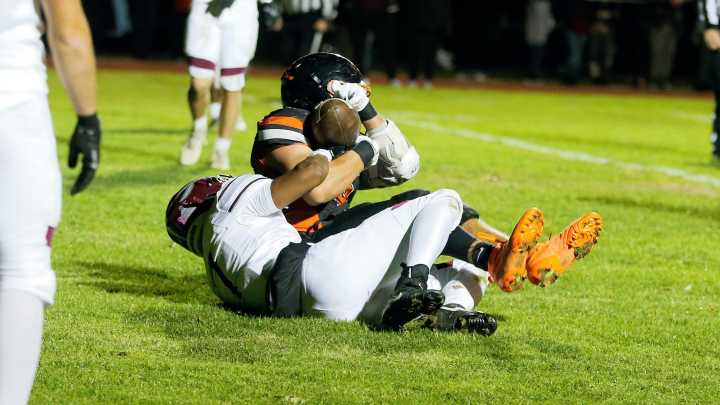 West Warwick's Luke Gallo hauls in a 6-yard touchdown vs. Woonsocket