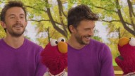 Jonathan Bailey And Elmo Practice Self-Care In New Video: ‘Remember, Give Yourself A Moment’