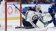 Jets goalie Hellebuyck to undergo arthroscopic procedure on his knee and miss 4 to 6 weeks