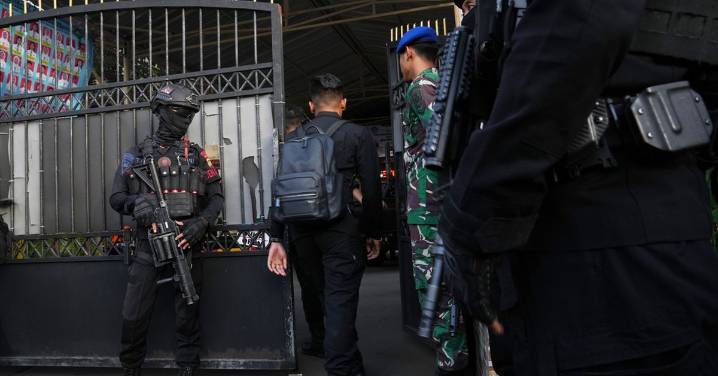 Multiple explosions shake a mosque in an Indonesian high school and injure 54