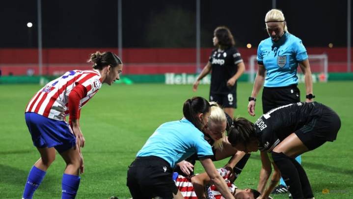 Collision leaves Atletico's Medina with head injury