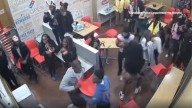 Halloween brawl at Domino's caught on camera, Glassboro, New Jersey police say officer hurt after chair thrown