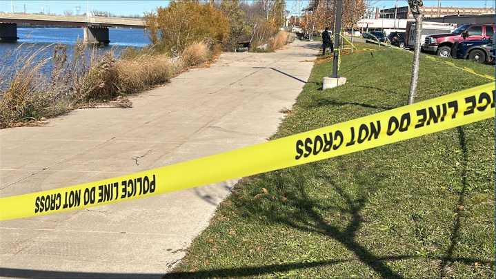 Police release more details about body pulled from Grand River
