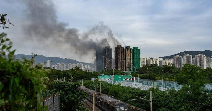 Hong Kong blaze death toll rises to 128, criminal arrests widen