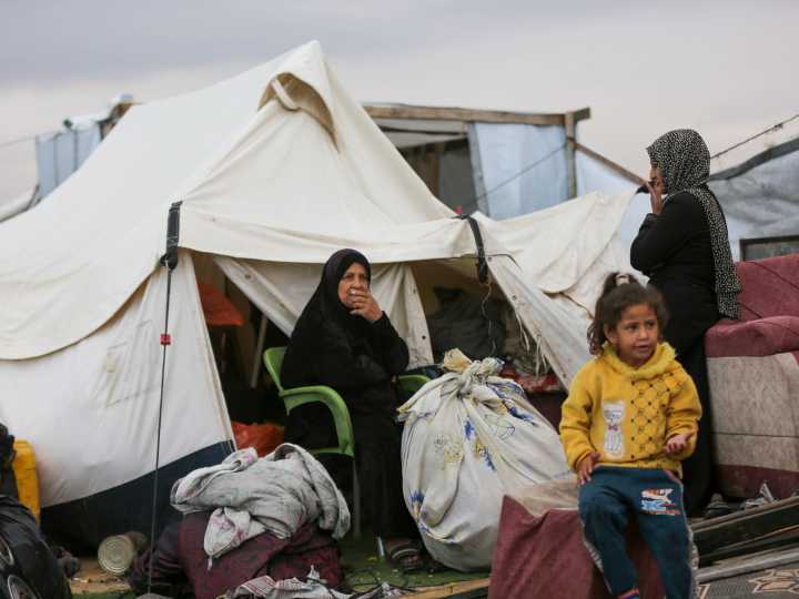 Israel kills at least three in Gaza, as thousands endure heavy flooding