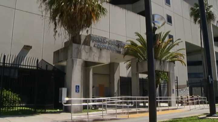 Brother of man found dead after Miami Police shootout arrested in alleged road