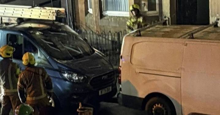 Firefighters rush to blaze at Glasgow flat as road closed