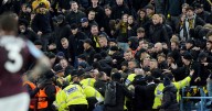 Aston Villa vs Young Boys SUSPENDED as away fans 'launch seats at police' in violent scenes