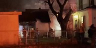 Scene video: Omaha firefighters pull person to safety from burning home