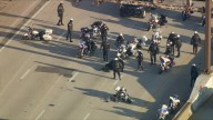 Officer crashes motorcycle on I-95 while participating in motorcade for charity event