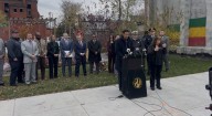 Charges formally announced at site of 2022 fatal fire