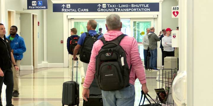 Holiday travelers fill airports and roads for Thanksgiving