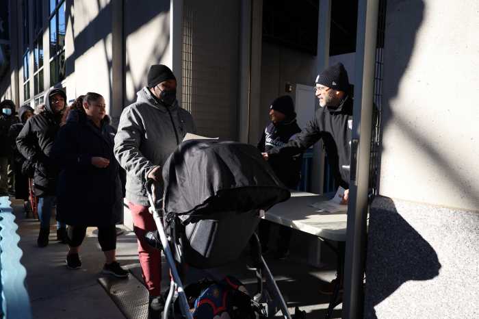 Photos: New York Yankees host their annual Thanksgiving Food Voucher Giveaway