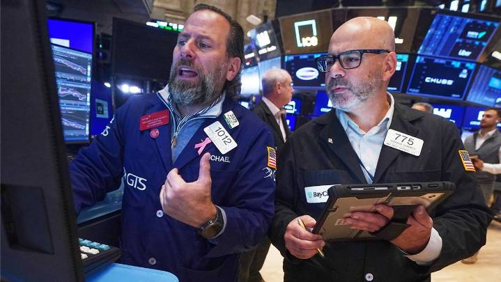 Big swings keep rocking Wall Street as U.S. stocks drop sharply after erasing a morning surge