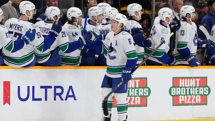 Canucks use resolve and resilience to salvage two points in OT