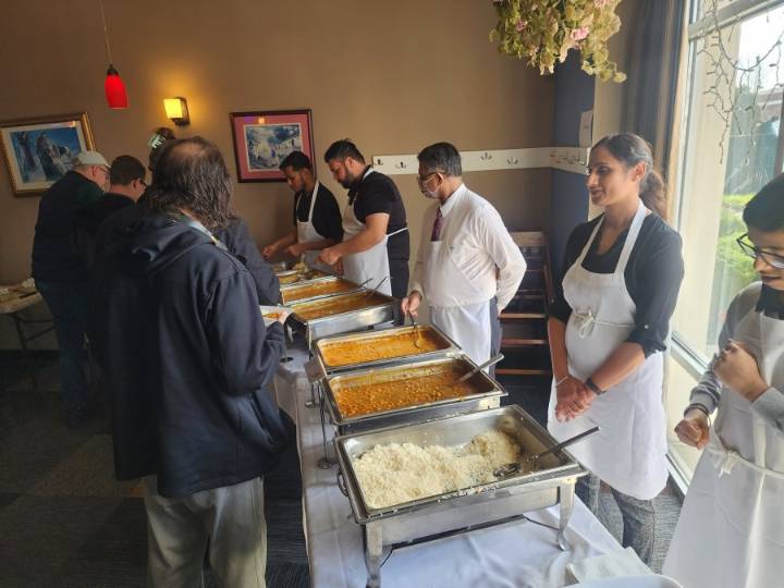 Amar India hosts free Thanksgiving lunch; supports the Foodbank, Inc.