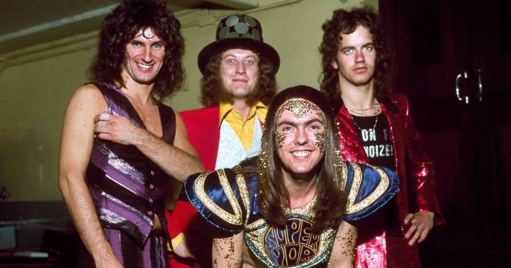 Slade's popularity is due to songs gving fans 'fun and colour' during difficult times