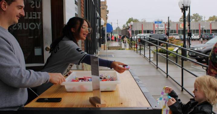 Frights and Delights: Costumed kids follow Trail of Treats in downtown Marion