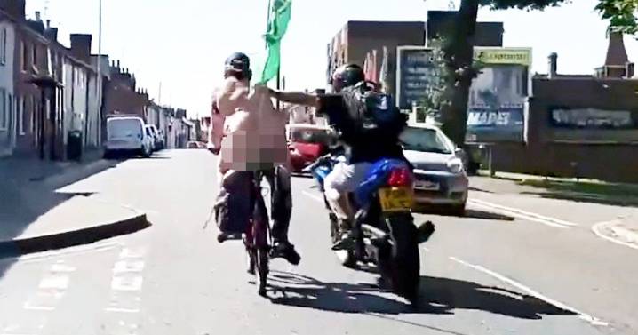 Disturbing moment binman punches naked cyclist off bike during charity ride 'by mistake'