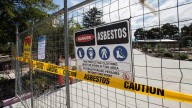 Schools, preschools closed over asbestos sand in Canberra, Brisbane