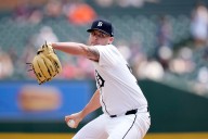 Tigers DFA longtime reliever to claim hometown arm off waivers