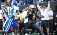 Pavia throws for 484 yards, Vandy sinks Kentucky 45