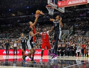Fox shines in season debut as Spurs down Pelicans, Hawks humble Lakers