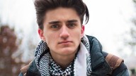 Teen wearing Middle Eastern neck scarf really putting society in its place