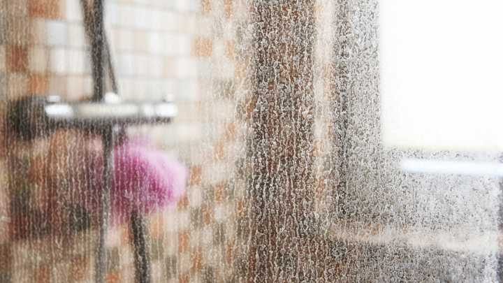 Make Glass Surfaces Shine With A Bathroom Staple