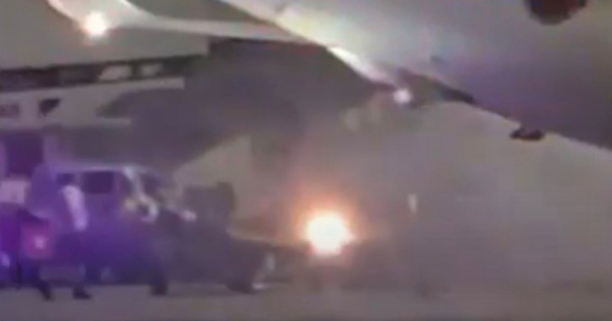 Horror plane fire as brakes catch alight just moments after touching down