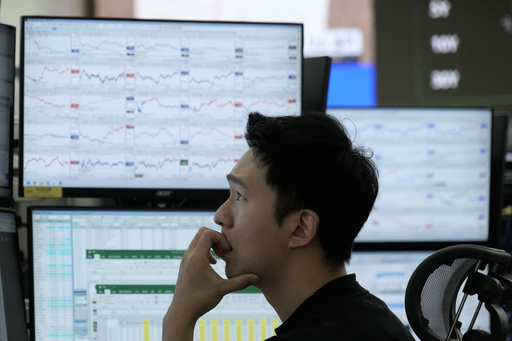 Asian shares fall, tracking Wall Street's tumble on worries about AI stocks and interest rates