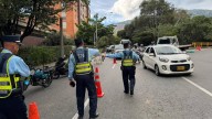 Capturado motociclista que tenía la licencia vencida, trabajaba en una app y atropelló a un guarda de tránsito en Medellín
