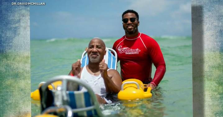 Father feels the ocean for first time in over 25 years thanks to his physical therapist son