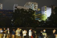 Mourners flock to site of deadly Hong Kong blaze
