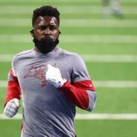 Former NFL star Brown extradited from Dubai to face trial in shooting