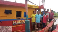Trawler seized; eight arrested