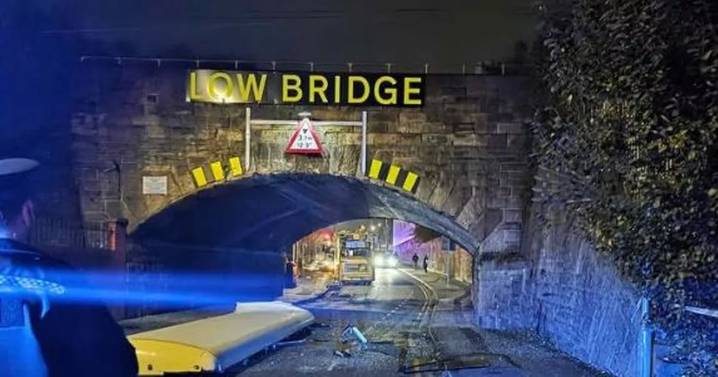 Roof ripped off bus as it hits low bridge in Greater Manchester town