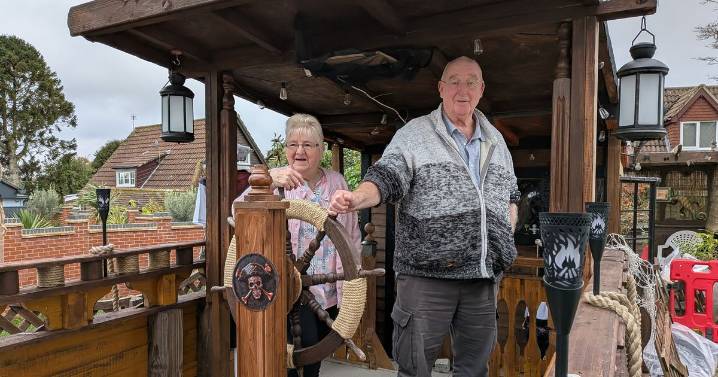 Shiver me timbers! Pirate ship in man's garden sparks row