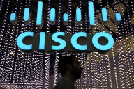 Cisco raises annual revenue forecast