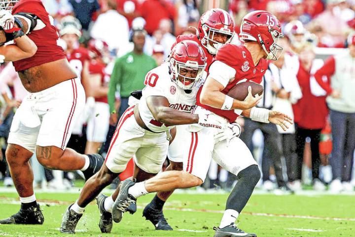 NCAA glance: No. 11 Oklahoma pulls off road upset of No. 4 Bama to keep CFP hopes alive