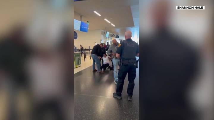 Attorney claims woman arrested at SLC Airport has legal work permit and a case to remain in US