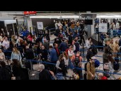 What should travelers do to prepare for flight disruptions?