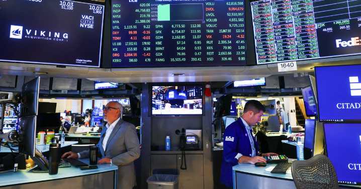 Stocks rise to cap wild week on Wall Street