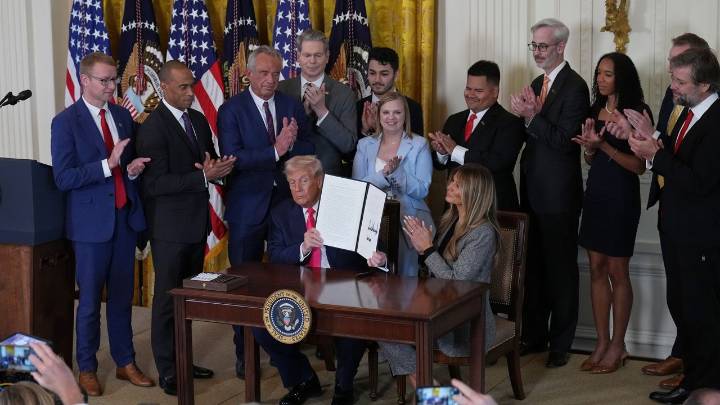 Trump, joined by first lady, signs order aimed at boosting resources for foster youth