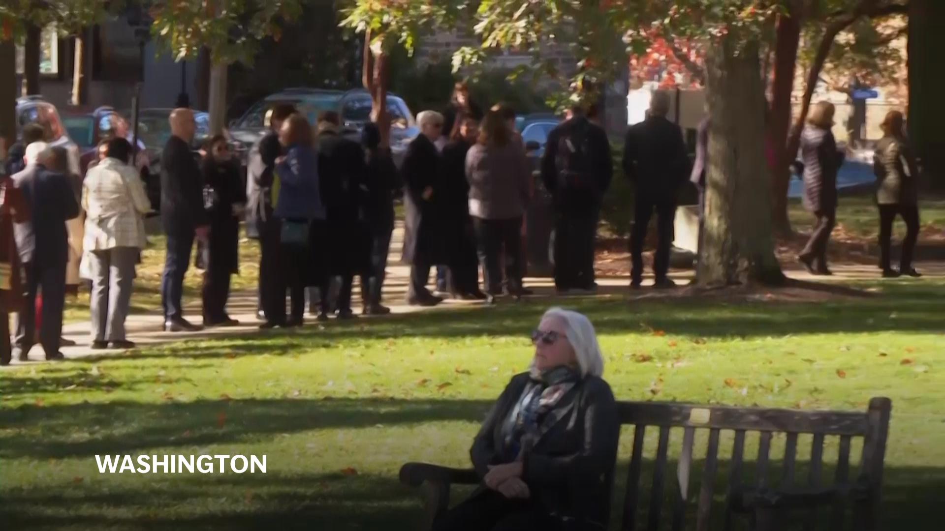 Therapy dogs greet Jane Goodall's ashes, guests at Washington funeral