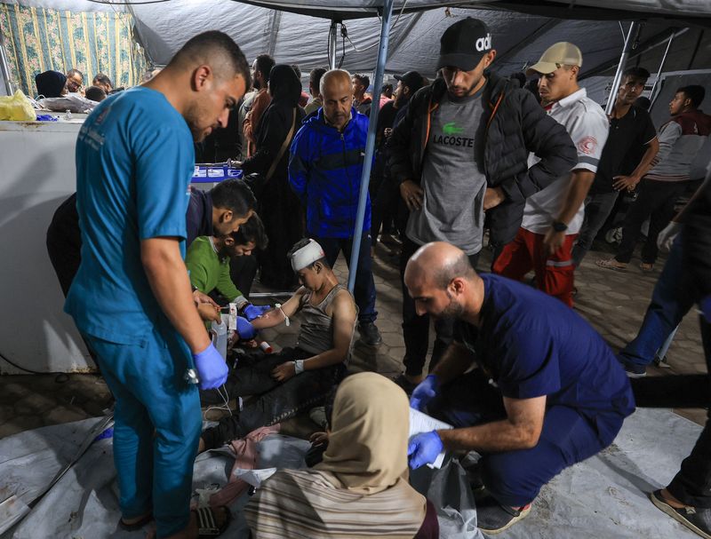 Israeli airstrikes kill 10 Palestinians in Gaza, rattling ceasefire, medics say