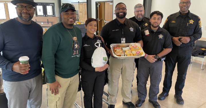 Milwaukee sheriff's deputies pack 150 Thanksgiving meal kits for families in need